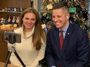Winnipeg Mayor Brian Bowman, accompanied by his wife Tracy, speak with the Winnipeg Sun during a year-end interview on Tuesday Dec. 21, 2021. Handout photo