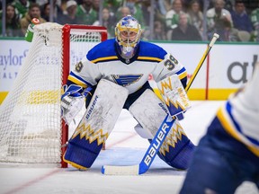 St. Louis Blues goaltender Charlie Lindgren (39) faces the Dallas Stars attack during the second period at the American Airlines Center in Dallas on Dec. 14, 2021.