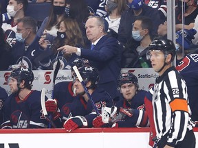 Winnipeg Jets Interim head coach Dave Lowry gestures in the first period against the Washington Capitals at Canada Life Centre at Canada Life Centre in Winnipeg on Dec. 17, 2021.