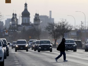 Holy Trinity Ukrainian Orthodox Metropolitan Cathedral fills the background of this street scene in Winnipeg on Saturday, Dec. 4. 2021.