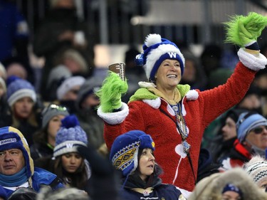 Fan action during the CFL West Final between the Winnipeg Blue Bombers and Saskatchewan Roughriders in Winnipeg on Sunday, Dec. 5, 2021.