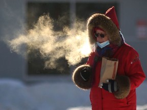 A person's breath hangs in the air during extreme cold in Winnipeg on   Wednesday. Chris Procaylo/Winnipeg Sun