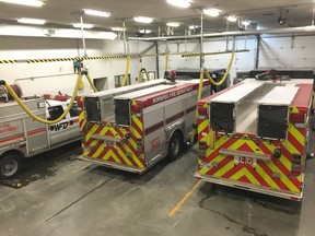 Hoses attached to fire truck exhaust systems remove diesel fumes from fire halls. Handout photo