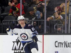 Fans react as Kyle Connor of the Winnipeg Jets celebrates after scoring a goal in overtime against the Vegas Golden Knights to win their game 5-4 at T-Mobile Arena on Jan. 2, 2022 in Las Vegas, Nevada. Connor is a finalist for the 2022 Lady Byng trophy.