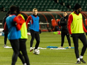 Team Canada head coach John Herdman, watching his players practise in Edmonton last November, says this team was built to handle the challenge of playing three World Cup qualifying games in a week without its top player.