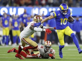 Cooper Kupp of the Los Angeles Rams runs after a catch in the fourth quarter against the San Francisco 49ers in the NFC Championship Game on Sunday at SoFi Stadium.