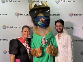 Adult Ambassadors' General Sarahdelle Galera and Karman Sidhu with the Folklorama Llama.