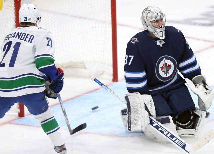 Winnipeg Jets hand Vancouver Canucks lopsided loss - The San Diego  Union-Tribune