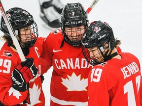 Ste. Anne, Man.’s Jocelyne Larocque, centre, is headed to her third Winter Olympics playing for the womens national hockey team. GETTY IMAGES