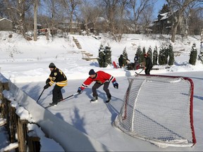 Getting outside can help improve a person's state of mind, including going for a skate on the river and joining in on a pickup hockey game. Kevin King/Winnipeg Sun