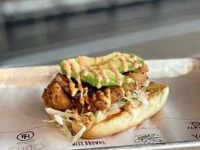 Yard Burger, last year's winner with a peanut butter, jam and fried chicken burger, is back this year for Winnipeg's fifth annual Fried Chicken Fest with The Shogun from chef Steve Toews which consists of katsu chicken, sesame, nori, pork belly, kewpie mayo, togarashi hot sauce, lettuce, tobiko and avocado, on a toasted potato bun.