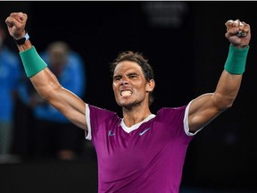 Spain's Rafael Nadal celebrates after victory against Italy's Matteo Berrettini during their men's singles semi-final match on day twelve of the Australian Open tennis tournament in Melbourne on January 28, 2022.