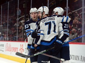 Winnipeg Jets left wing Evgeny Svechnikov (71) celebrates his goal against the Arizona Coyotes during the first period at Gila River Arena in Glendale, Ariz., on Jan. 4, 2022.