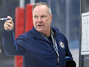 Head coach Dave Lowry diagrams a drill during Winnipeg Jets practice in Winnipeg on Tuesday, Jan. 11, 2022.