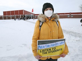 Brie Villeneuve, a Grade 12 student at Grant Park high school, takes part in a student walkout in Winnipeg on Monday, Jan. 17, 2022.