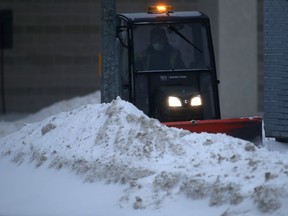 A small snow clearing machine at work in downtown Winnipeg on Friday, Jan. 21. 2022.