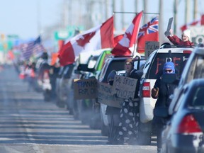 Supporters of the trucker convoy headed for Ottawa show their support in Winnipeg on Tuesday.  Chris Procaylo/Winnipeg Sun