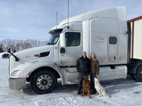 Tim and Jennifer Plett are the owners of Plett Trucking in Landmark, a trucking company that has seen the vast majority of their international truckers get fully vaccinated. Handout photo