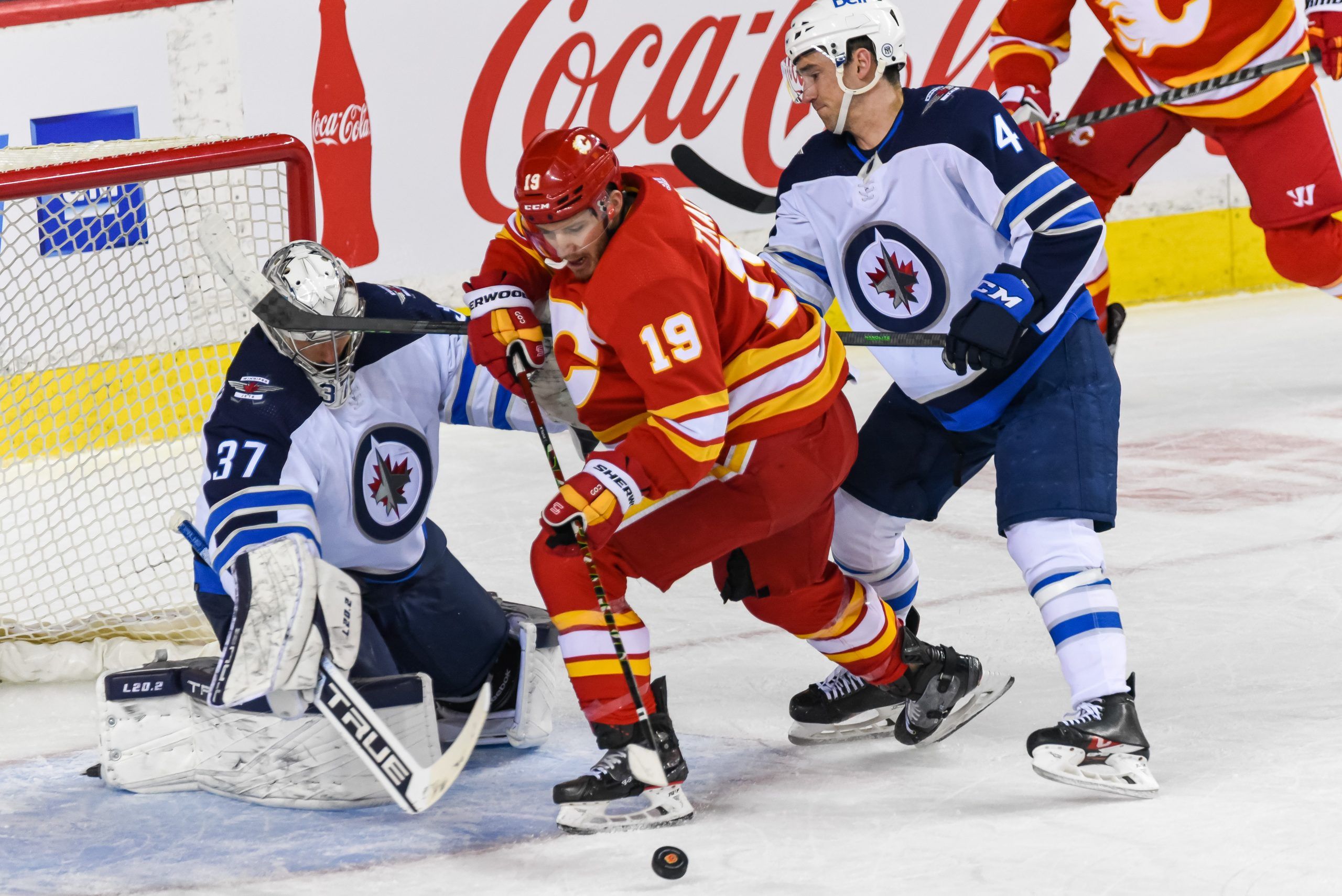 Winnipeg Jets preseason vs. Calgary Flames tonight, Connor Hellebuyck  starts in goal 