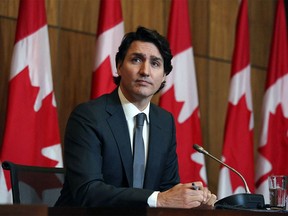 In this file photo taken on January 12, 2022 Canada's Prime Minister Justin Trudeau speaks at a news conference on the COVID-19 situation in Ottawa, Canada.