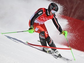 Canada's James Crawford competes in the men's alpine combined downhill event during the Beijing 2022 Winter Olympic Games at the Yanqing National Alpine Skiing Centre in Yanqing on February 10, 2022.