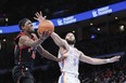 Raptors' Pascal Siakam goes to the basket as Oklahoma City Thunder's Kenrich Williams defends during the second quarter at Paycom Center on Wednesday, Feb. 9, 2022.