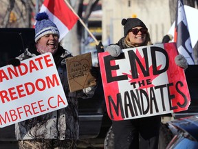 Freedom Convoy protestors near the Manitoba Legislative Building in Winnipeg on Sunday, Feb. 6, 2022.