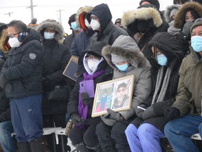 Friends, family and members of Winnipeg's tight-knit Filipino community braved the cold on Saturday for a vigil to honour 19-year-old John Lloyd Barrion who was murdered early Tuesday morning. Many held signs with the hashtag #Justice4JohnLloyd while members of his family held his picture. Winnipeg Police are still investigating and no suspects or motive have been identified.