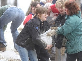 City of Winnipeg has identified 16 properties that may be at risk of river flooding and may require dikes and is hand-delivering notices to affect property owners.