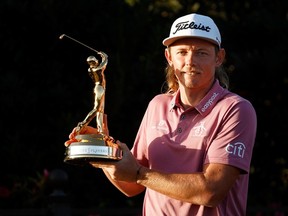 Australian Cameron Smith shows off The Players Championship Trophy after winning the tournament at TPC Sawgrass on Monday in Ponte Vedra Beach, Fla.