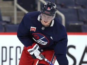 Andrew Copp loads up a shot at Jets practice yesterday. KEVIN KING/Winnipeg Sun