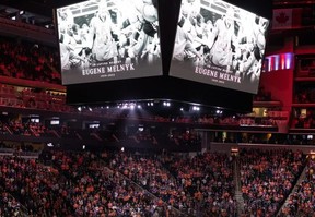 A moment of silence is held in memory of Ottawa Senators owner Eugene Melnyk in Edmonton. It is believed that a handful of potential ownership groups have already expressed an interest in purchasing the money-losing Senators. Ian Kucerak/Postmedia