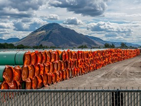 Steel pipe to be used in the oil pipeline construction of the Canadian government’s Trans Mountain Expansion Project lies at a stockpile site in Kamloops, B.C., June 18, 2019.