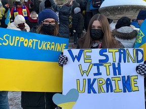 Romanna Klymkiw, left, seen here with her sister Katrina at a rally in support of Ukraine at the Manitoba Legislative building last Saturday, said she has been watching recent events in Ukraine closely because she has deep ties to the country that is now under attack from neighbouring Russia. Handout photo