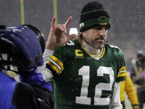 Green Bay Packers quarterback Aaron Rodgers reacts while leaving the field after the NFC divisional playoff round game against the San Francisco 49ers at Lambeau Field.