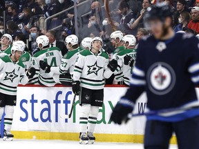 Dallas Stars left wing Jason Robertson (21) celebrates his second period goal against the Winnipeg Jets at Canada Life Centre in Winnipeg on Friday, March 4, 2022.