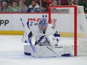 Tampa Bay Lightning goaltender Andrei Vasilevskiy (88) makes a save on a shot from Chicago Blackhawks right wing Patrick Kane during the second period at the United Center in Chicago on Sunday, March 6, 2022.