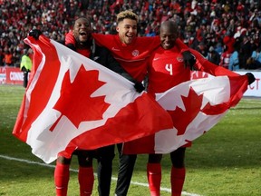 Canada players celebrate after qualifying to the World Cup 2022 in a CONCACAF qualifier against Jamaica in Toronto on Sunday. Canada won 4-0 to earn a berth into the FIFA World Cup later this year in Qatar.