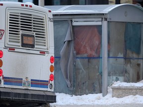 A transit bus near a Winnipeg bus shack that is no longer available to the public because it has been converted to living space. Chris Procaylo/Winnipeg Sun