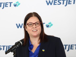 Manitoba Premier Heather Stefanson speaks at press conference at Winnipeg Richardson International Airport on Monday, to announce WestJet Airlines’ restored summer schedule.