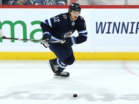 Winnipeg Jets forward Mason Appleton carries the puck against the Vegas Golden Knights in Winnipeg on Tuesday, March 22, 2022.