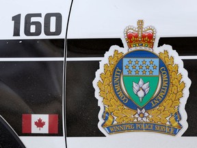 Symbols on a Winnipeg Police Service vehicle.