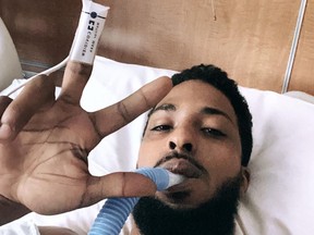 Saunders posted photos of himself and his mangled car on social media after crashing his car in Atlanta last year.