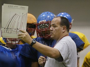 Churchill Bulldogs head coach Kelsey McKay directs his players during practice.