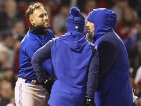 George Springer of the Toronto Blue Jays looks on after being hit by a pitch at Fenway Park on April 20, 2022 in Boston, Massachusetts.