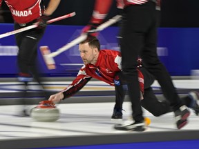 Canada skip Brad Gushue delivers a rock against Sweden LGT World Men’s Curling Championship final at Orleans Arena in Las Vegas on Sunday, April 10, 2022.