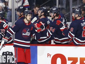 Winnipeg Jets center Mark Scheifele (55) celebrates his first period goal against the Colorado Avalanche at Canada Life Centre in Winnipeg on Friday, April 8, 2022.