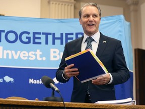 Finance Minister Cameron Friesen announces Budget 2022 at the Manitoba Legislative Building in Winnipeg on Tuesday, April 12, 2022.
