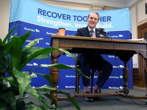 Finance Minister Cameron Friesen announces Budget 2022 at the Manitoba Legislative Building in Winnipeg on Tues., April 12, 2022.  KEVIN KING/Winnipeg Sun/Postmedia Network