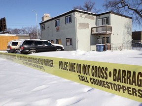 Police presence at an apartment building on Elgin Avenue just east of Isabel Street in Winnipeg on Monday, April 18, 2022, where a suspicious death is believed to have occurred.